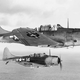 Two US Navy Douglas SBD-5 Dauntless dive bombers from bombing squadron VB-5 return to the aircraft carrier USS Yorktown (CV-10) after the attack on Wake Island, October 5, 1943. (US Navy)